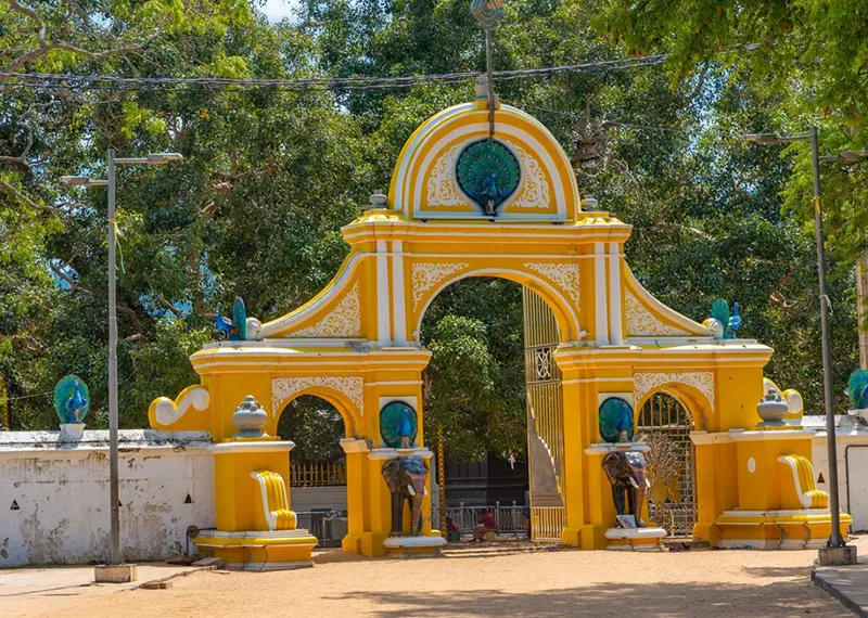 A stunning yellow temple gateway captured on private Sri Lankan cultural tours