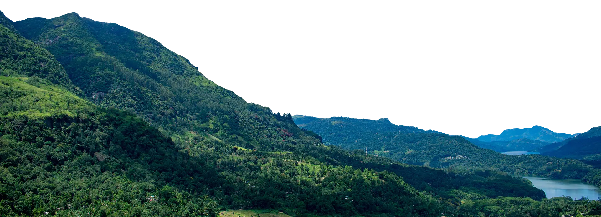 A lush, green mountain range overlooking a calm lake, representing the breathtaking natural landscapes featured in Sri Lanka