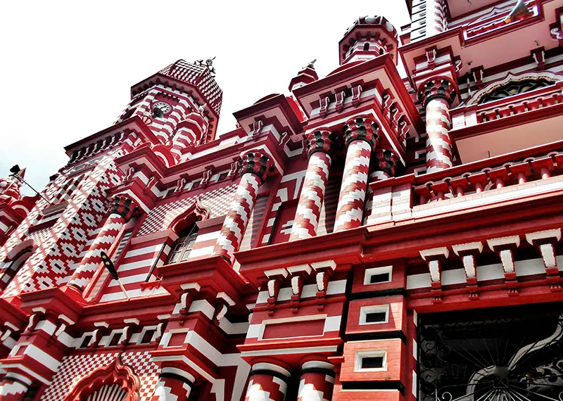 Distinctive red and white candy-striped architecture of the historic Red Mosque, Colombo
