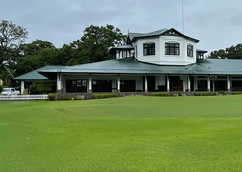 The historic clubhouse of the Royal Colombo Golf Club sits by greens