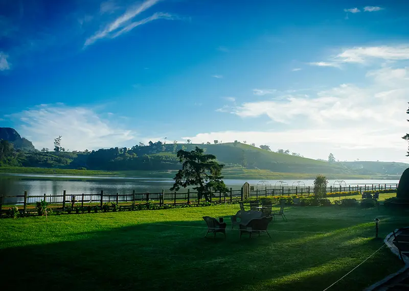 Peaceful green lawn and lake view at a beautiful Sri Lankan resort