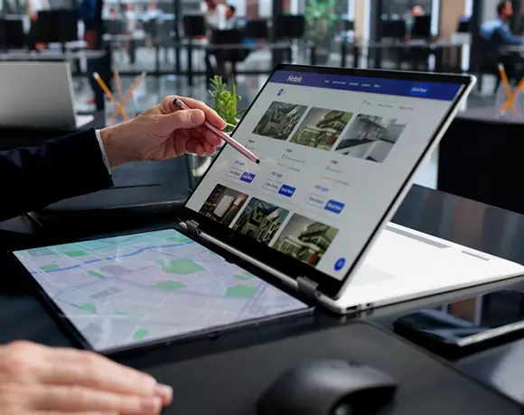 A travel consultant using a digital map and booking platform to select the best accommodations for our carefully planned Sri Lanka itinerary packages